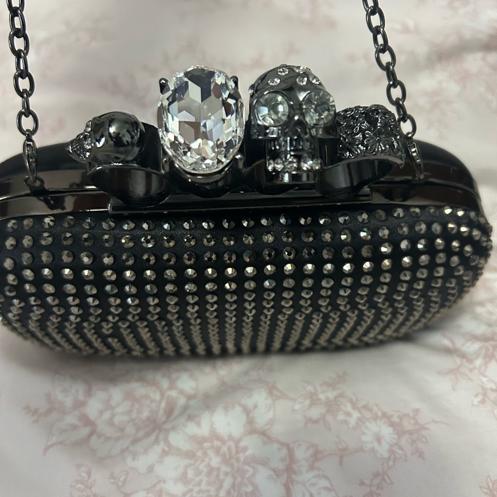 Black Studded Clutch with Skull Accents